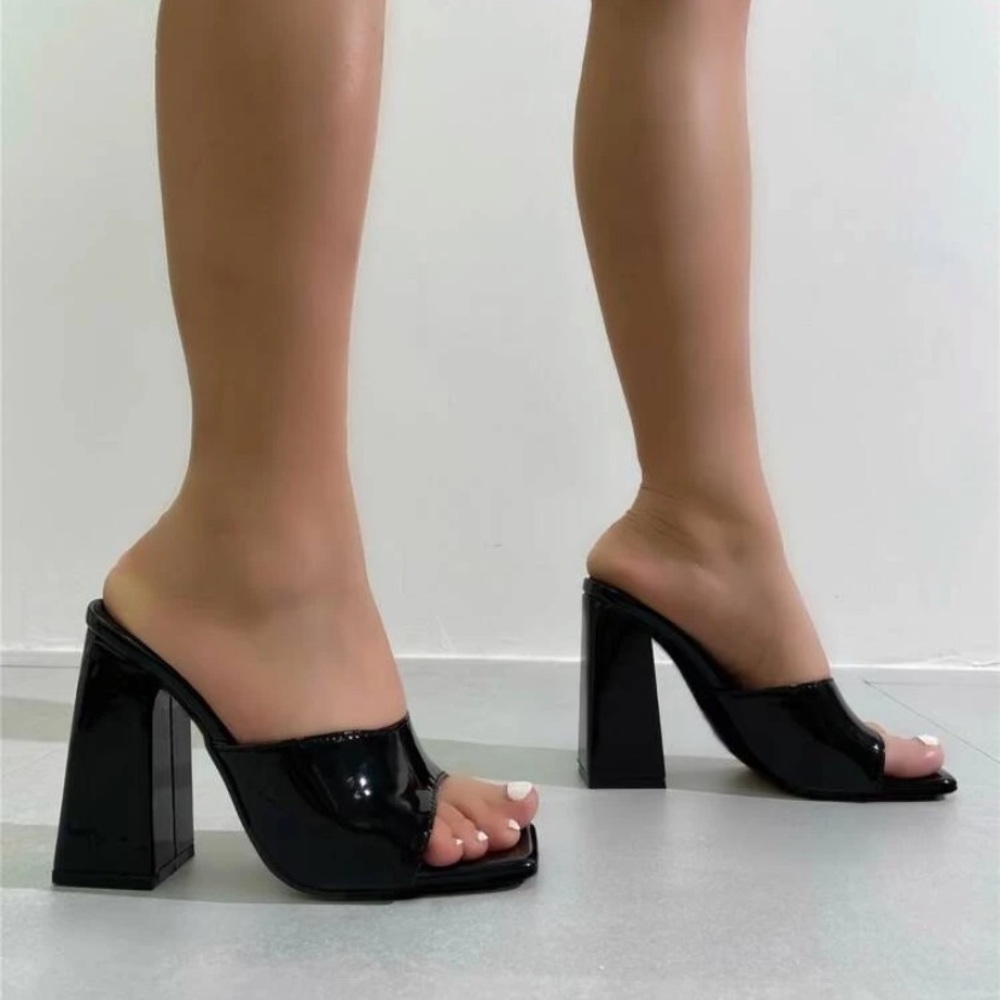 Shiny black heeled mules
